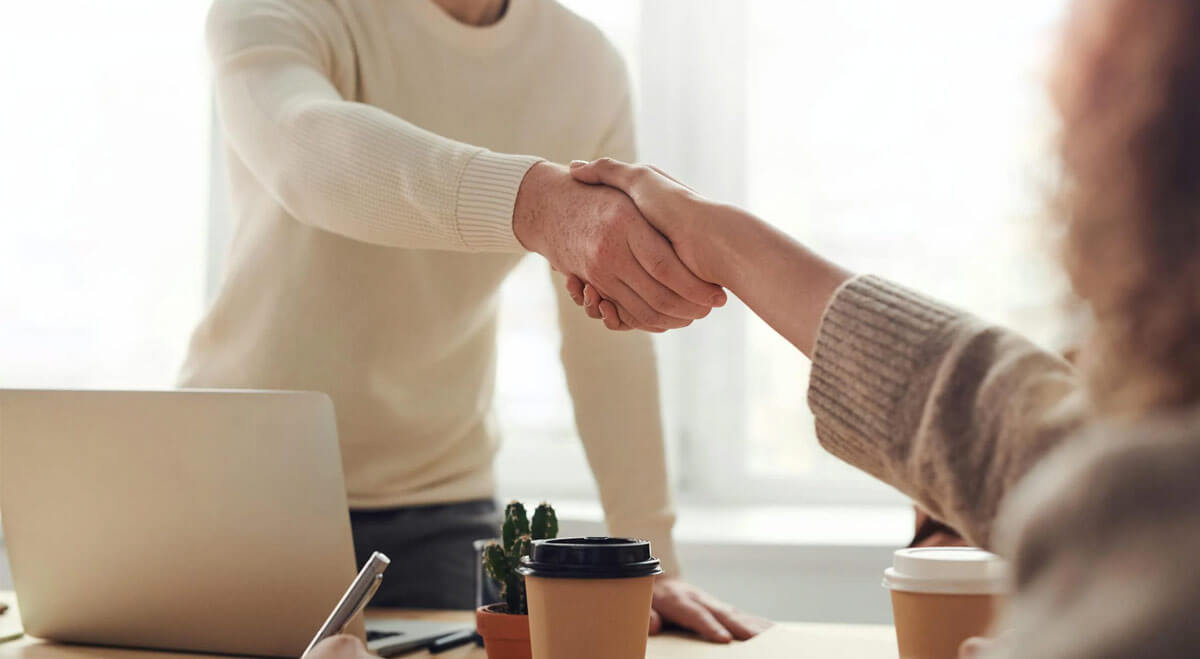 Handshake between two people