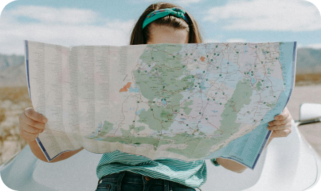 A female looking at a map